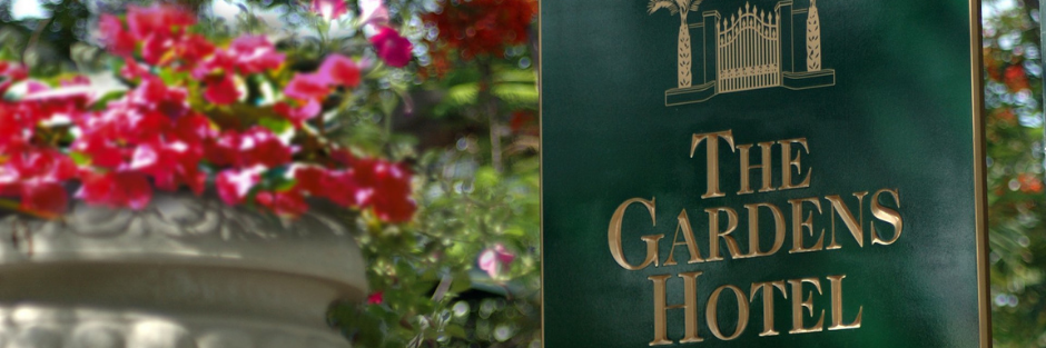 Gardens hotel exterior sign hero